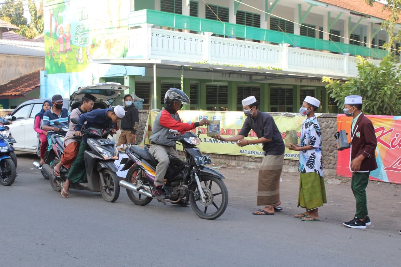 BAKTI ROMADHON DALAM MEWUJUDKAN KETEGUHAN HATI DENGAN MEMBERI dan BERBAGI